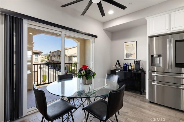 dining room featuring ceiling fan