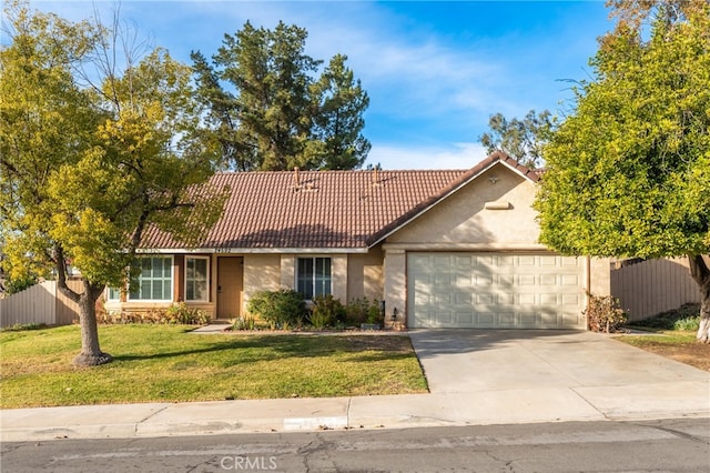 ranch-style house with a front lawn and a garage