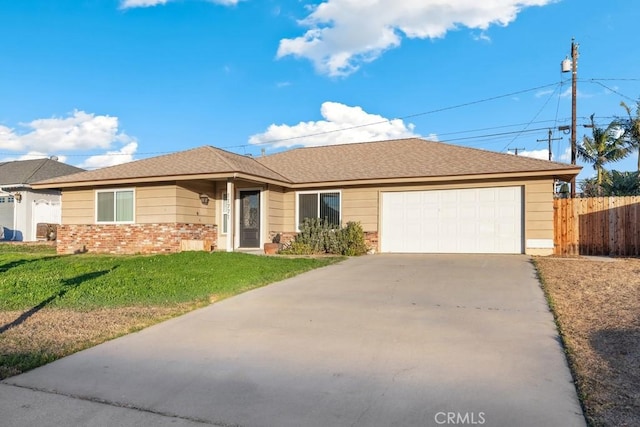 ranch-style house with a front yard and a garage