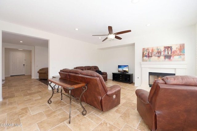 living room with ceiling fan