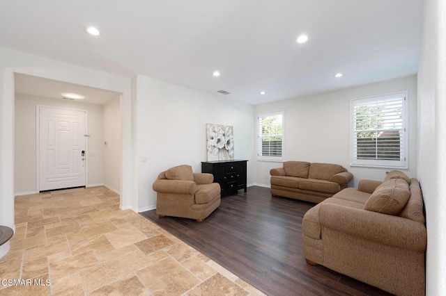 living room featuring plenty of natural light