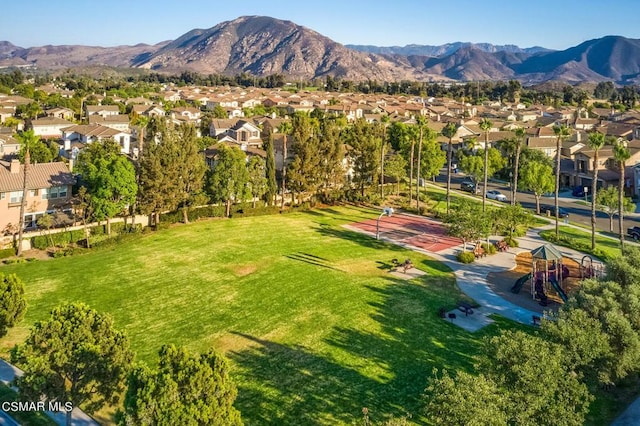 drone / aerial view featuring a mountain view