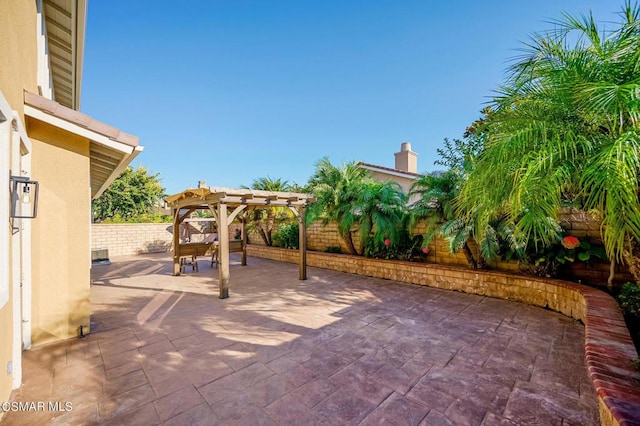 view of patio with a pergola