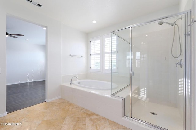 bathroom featuring ceiling fan, tile patterned flooring, and shower with separate bathtub