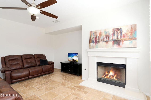 living room with ceiling fan