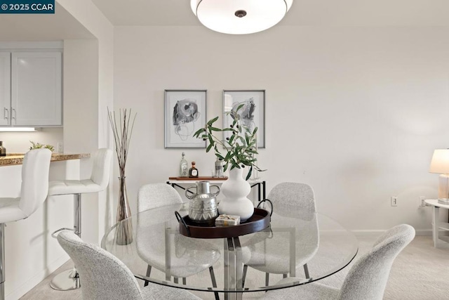 view of carpeted dining room