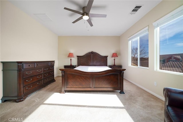 bedroom featuring ceiling fan and light colored carpet