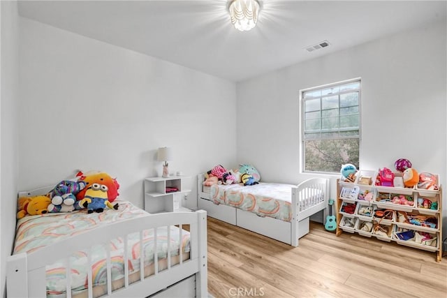 bedroom featuring light hardwood / wood-style flooring