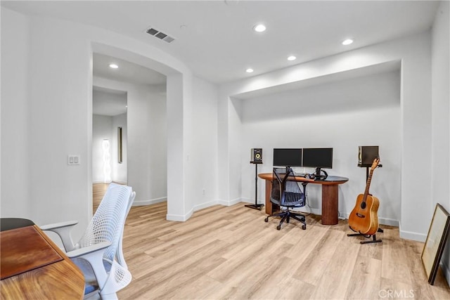 office area with light hardwood / wood-style flooring