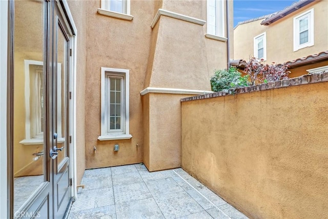 balcony featuring french doors