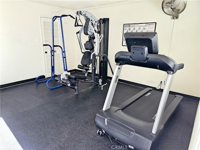 exercise area with crown molding