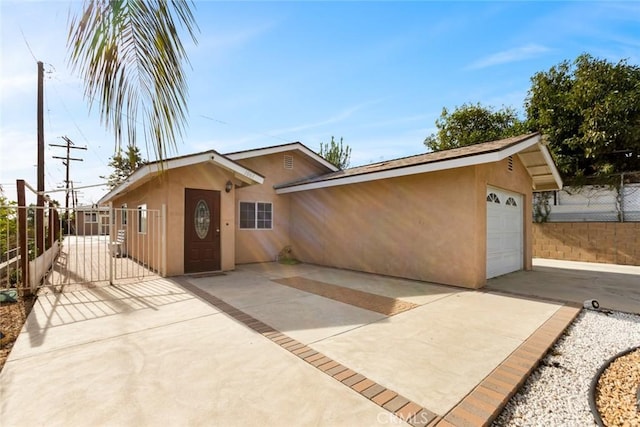 view of front of home with a garage