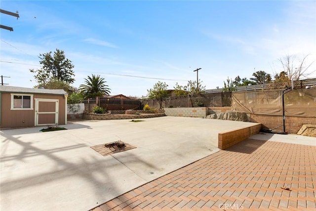 view of patio / terrace featuring a storage shed