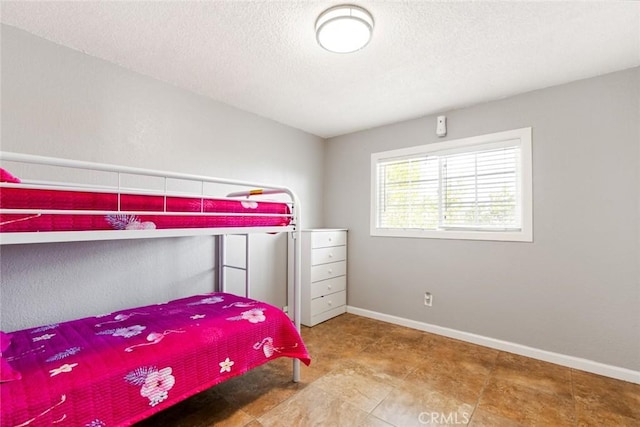 bedroom with a textured ceiling