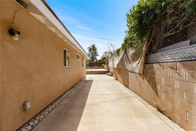 view of home's exterior with a patio area