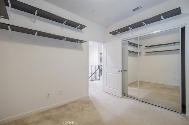 basement featuring light colored carpet