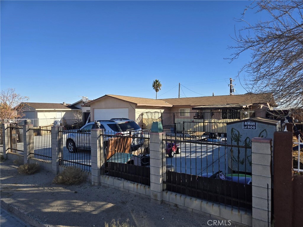217 Plaimor Ave, Barstow, CA 92311 - view of front of home with an outbuilding