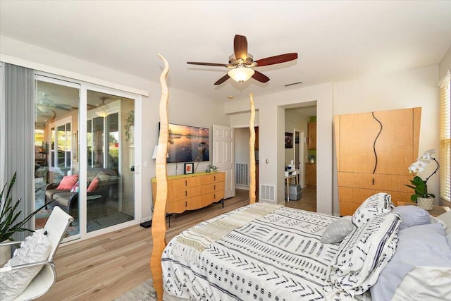 bedroom featuring access to outside, ceiling fan, and hardwood / wood-style flooring