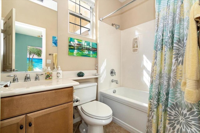 full bathroom with toilet, vanity, and shower / bath combo