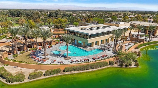 bird's eye view with a water and mountain view