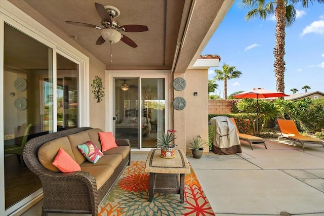 view of patio / terrace with ceiling fan and outdoor lounge area