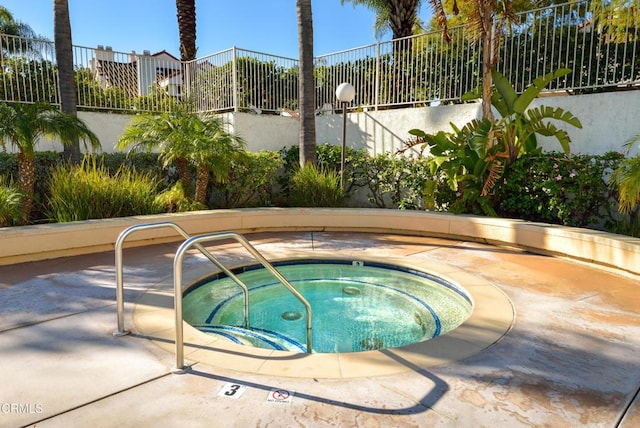 view of pool featuring a community hot tub