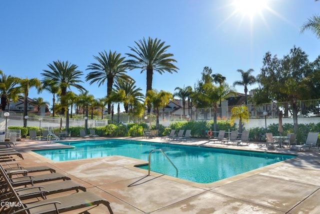 view of swimming pool featuring a patio