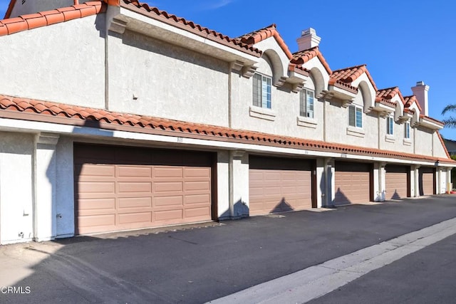 exterior space featuring a garage