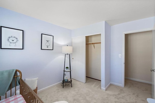 carpeted bedroom featuring a closet