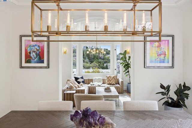 dining area with an inviting chandelier