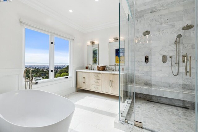 bathroom with independent shower and bath, ornamental molding, tile patterned floors, and vanity