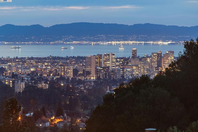 city view with a water and mountain view