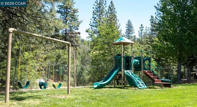 view of playground with a yard