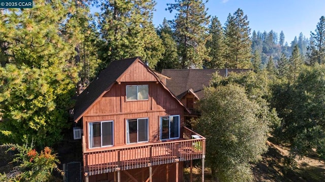 rear view of house with a deck