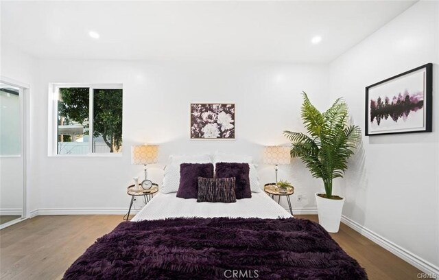 bedroom featuring hardwood / wood-style flooring