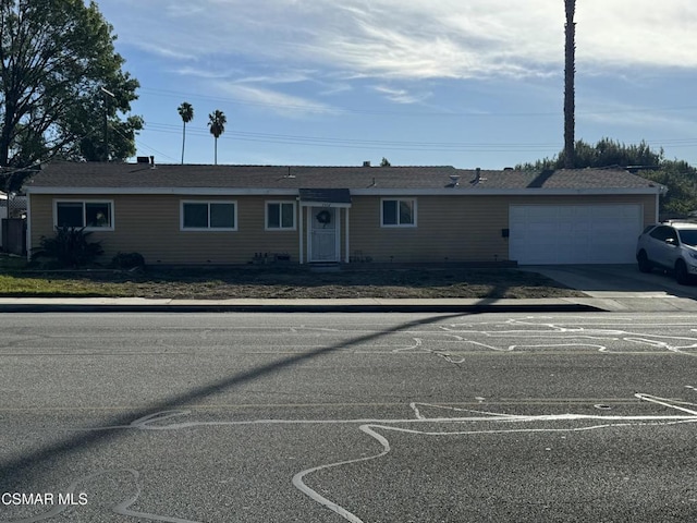 single story home with a garage