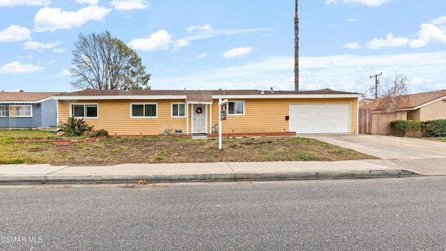 single story home with a garage