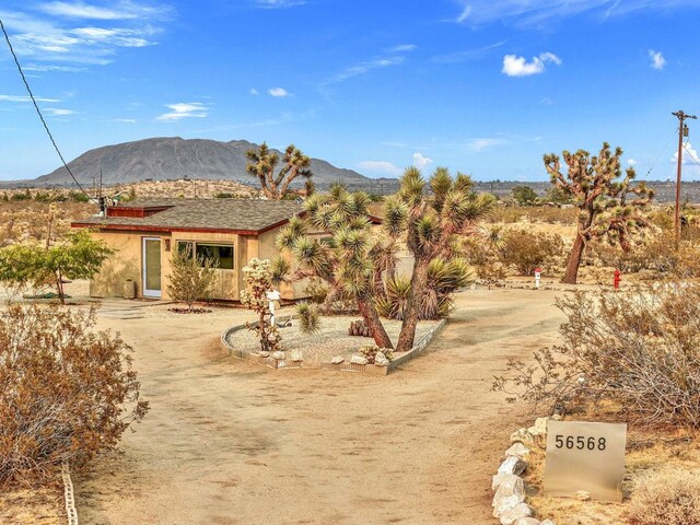 exterior space featuring a mountain view