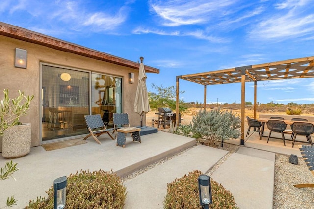 view of patio featuring a pergola