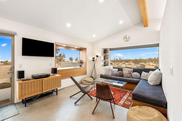 living room featuring lofted ceiling with beams and a wealth of natural light