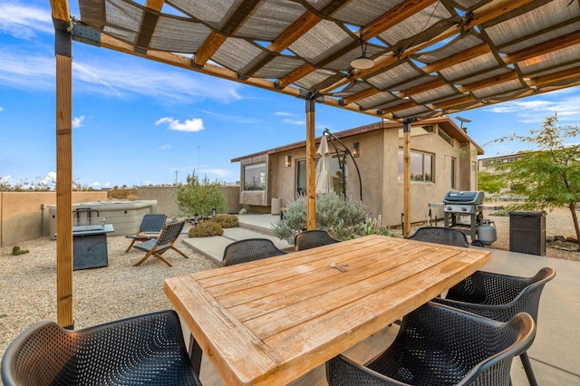 view of patio with grilling area and a pergola