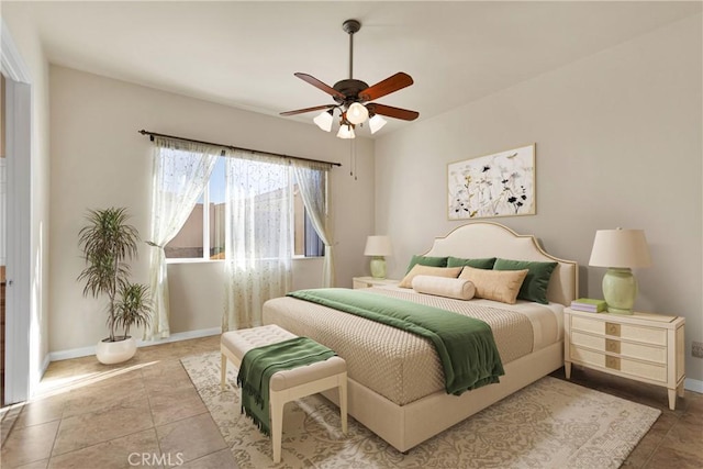 bedroom featuring ceiling fan and light tile patterned floors