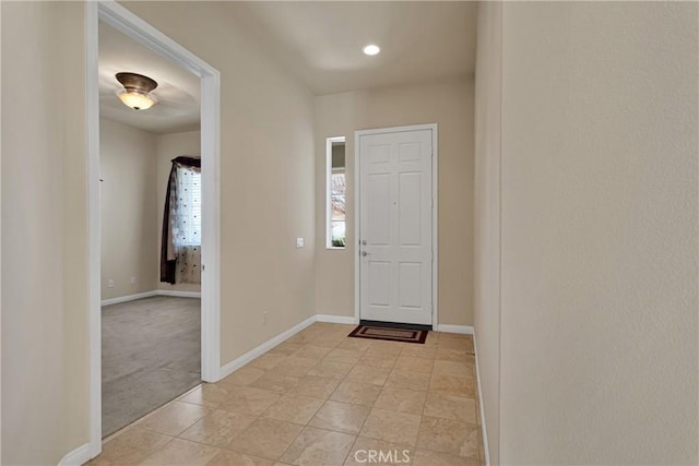19269 Galloping Hill Rd, Apple Valley, CA 92308 - entrance foyer with baseboards, light colored carpet, and recessed lighting