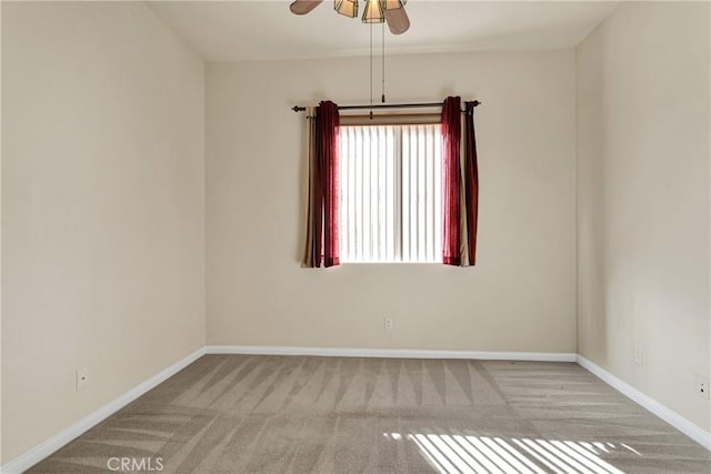 19269 Galloping Hill Rd, Apple Valley, CA 92308 - empty room with baseboards, ceiling fan, and carpet flooring