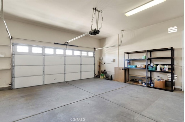 garage featuring a garage door opener