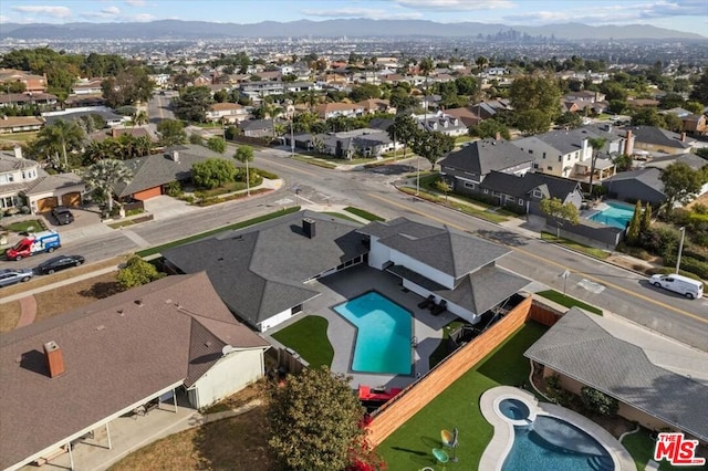 bird's eye view with a mountain view