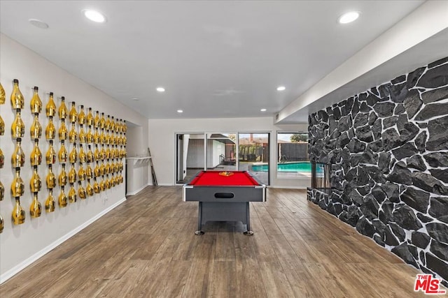 playroom with wood-type flooring and pool table