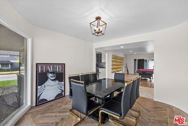 dining space featuring billiards, parquet floors, and an inviting chandelier