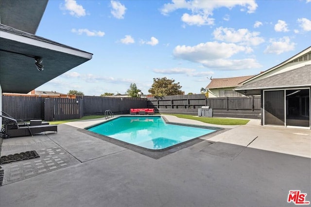 view of pool with a patio area