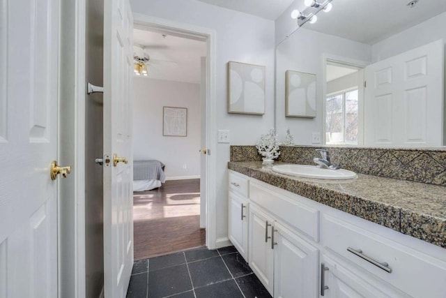 bathroom with vanity, ceiling fan, and tile patterned floors